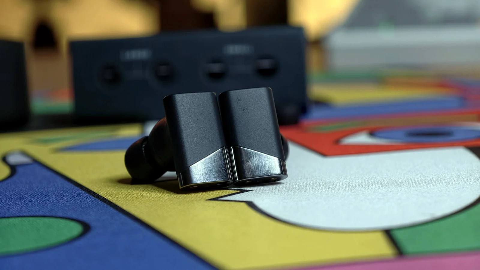 Auricolari Status Audio Pro X fuori dal case